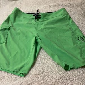 Men’s lime green swim shorts